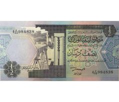 1/2 dinar 1991 Líbya arabský nápis na reverz bankovky